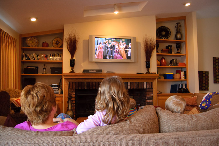 Starting Christmas vacation off right--on the sofa, watching The Nutcracker with Grandma