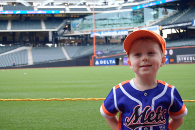 Moments before the most exciting event of Ivan's year (the Mr. Met Dash) and he can only grimace with excitement