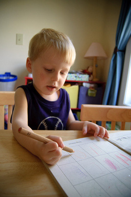 Breaking out the tank top so he can color more freely