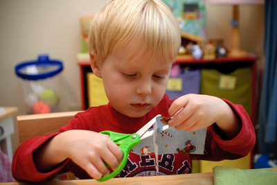 Working determinedly on Christmas crafts, even on a snow day