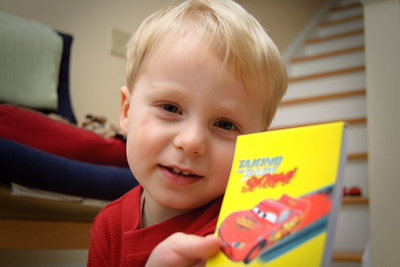 Pausing to pose with a likeness of his favorite character, Lightning McQueen (like we needed any reminder)