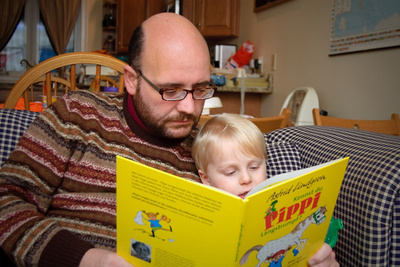 Curling up to a good book with Uncle Bobo