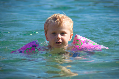 Swimming by himself! (floaties don't count)