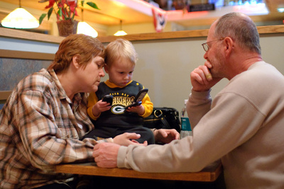 Working the phones with Grandma and Grandpa