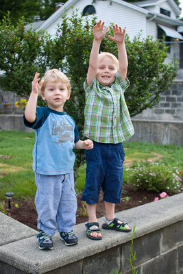 Seeing their big sister off to school at the bus stop in the morning