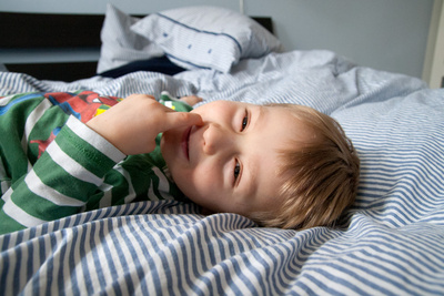 When you're sick, there's no better medicine than spending some time in Mama and Papa's bed