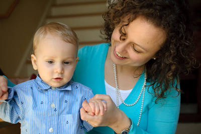 Walking with a helping hand from Mama