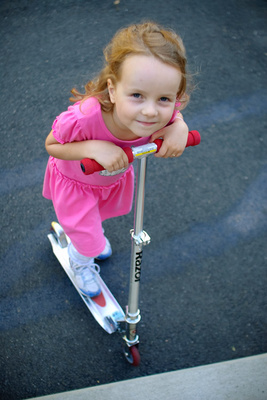 With her prized scooter (photo taken at her request)