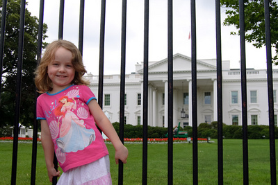 A very proud kindergartner in front of 'Barack Obama's house'
