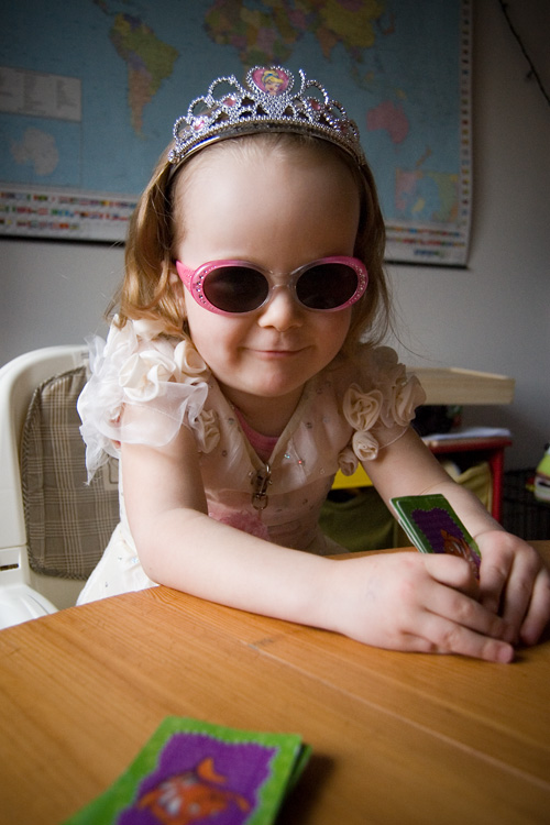 Don't let the smile fool you, this princess will win your lunch money at Go Fish