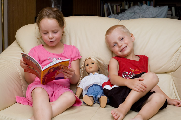 Veronika, reading to her most loyal followers, Julie and Ivan