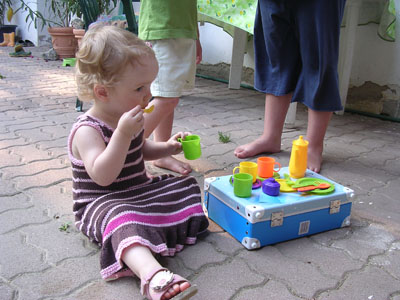 Making and serving tea with her new tea set