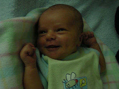 Pictures of a newborn smiling are hard to capture