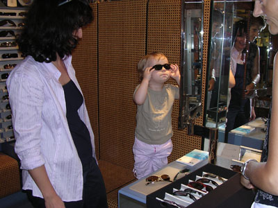Trying on a new pair of sunglasses for vacation